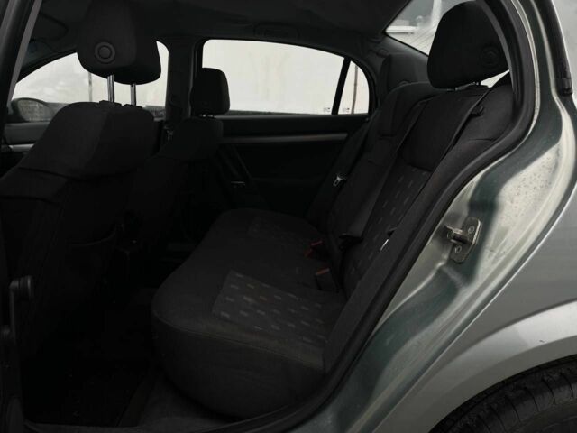 Зеленый Опель Вектра, объемом двигателя 1.9 л и пробегом 310 тыс. км за 1950 $, фото 7 на Automoto.ua