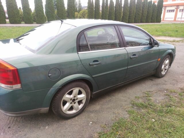 Зелений Опель Вектра, об'ємом двигуна 2 л та пробігом 333 тис. км за 2100 $, фото 10 на Automoto.ua