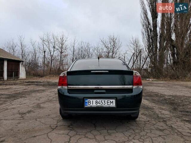 Зеленый Опель Вектра, объемом двигателя 2.2 л и пробегом 270 тыс. км за 5800 $, фото 6 на Automoto.ua