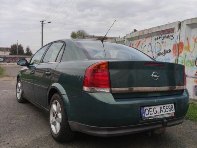 Зелений Опель Вектра, об'ємом двигуна 2 л та пробігом 333 тис. км за 2100 $, фото 6 на Automoto.ua