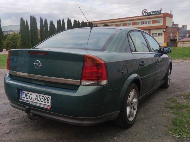 Зелений Опель Вектра, об'ємом двигуна 2 л та пробігом 333 тис. км за 2100 $, фото 9 на Automoto.ua