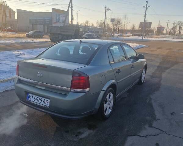 Зеленый Опель Вектра, объемом двигателя 2.2 л и пробегом 260 тыс. км за 4200 $, фото 4 на Automoto.ua