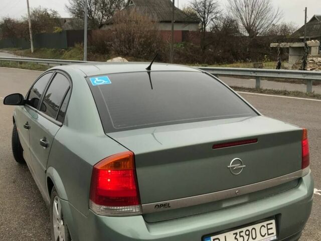 Зеленый Опель Вектра, объемом двигателя 1.8 л и пробегом 240 тыс. км за 3650 $, фото 1 на Automoto.ua