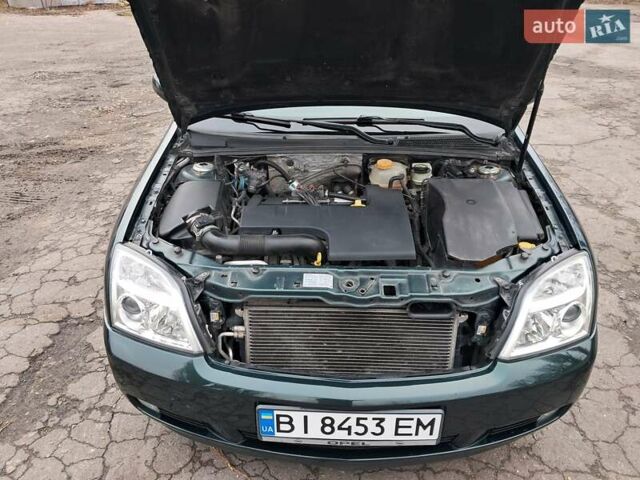 Зеленый Опель Вектра, объемом двигателя 2.2 л и пробегом 270 тыс. км за 5800 $, фото 20 на Automoto.ua