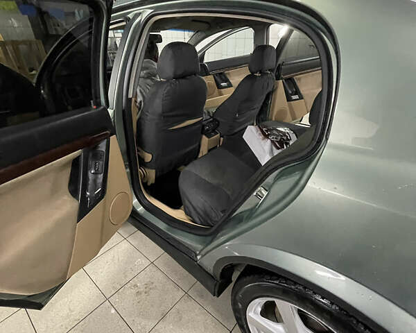 Зеленый Опель Вектра, объемом двигателя 2.2 л и пробегом 350 тыс. км за 3099 $, фото 6 на Automoto.ua