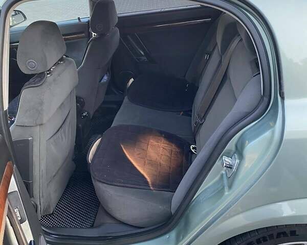 Зеленый Опель Вектра, объемом двигателя 2.2 л и пробегом 325 тыс. км за 4600 $, фото 22 на Automoto.ua