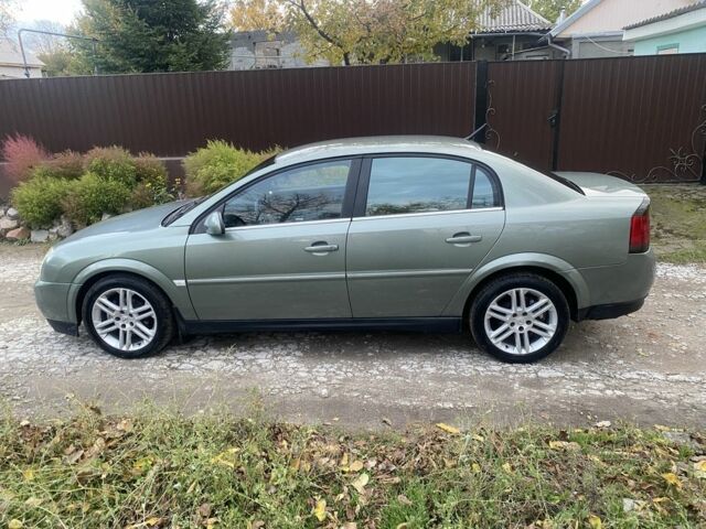 Зеленый Опель Вектра, объемом двигателя 2.2 л и пробегом 310 тыс. км за 4500 $, фото 2 на Automoto.ua