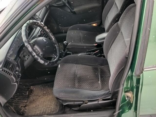 Зеленый Опель Вектра, объемом двигателя 1.6 л и пробегом 230 тыс. км за 1600 $, фото 5 на Automoto.ua