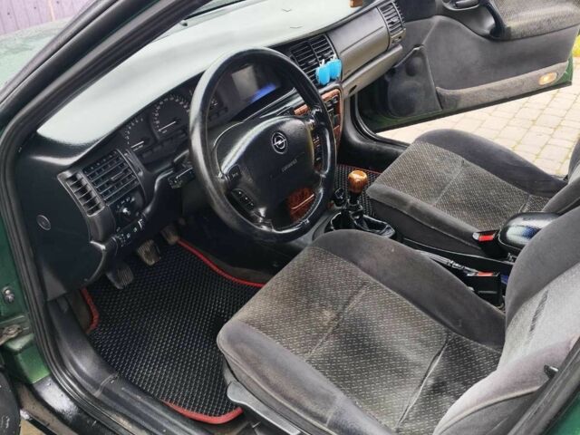 Зеленый Опель Вектра, объемом двигателя 1.8 л и пробегом 334 тыс. км за 2200 $, фото 7 на Automoto.ua