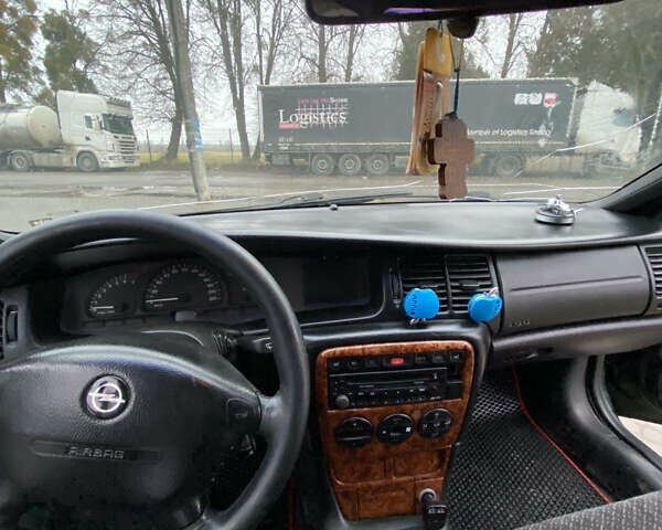 Зелений Опель Вектра, об'ємом двигуна 1.8 л та пробігом 400 тис. км за 1999 $, фото 19 на Automoto.ua