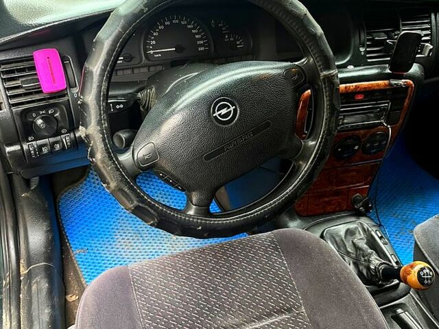 Зеленый Опель Вектра, объемом двигателя 2 л и пробегом 260 тыс. км за 3200 $, фото 6 на Automoto.ua