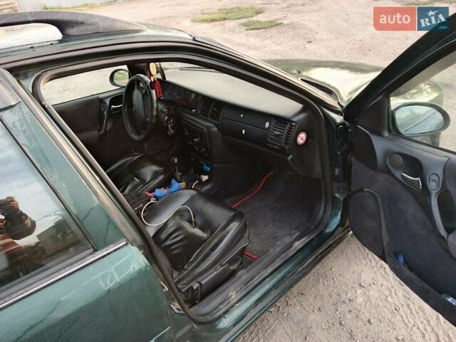 Зелений Опель Вектра, об'ємом двигуна 2.02 л та пробігом 350 тис. км за 2900 $, фото 9 на Automoto.ua