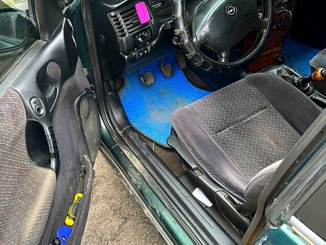 Зеленый Опель Вектра, объемом двигателя 2 л и пробегом 260 тыс. км за 3200 $, фото 5 на Automoto.ua