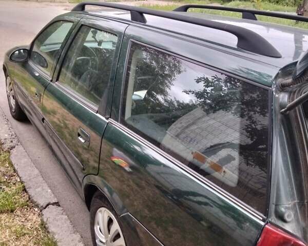 Зелений Опель Вектра, об'ємом двигуна 2 л та пробігом 355 тис. км за 1900 $, фото 12 на Automoto.ua