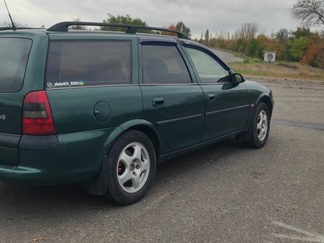 Зелений Опель Вектра, об'ємом двигуна 2.5 л та пробігом 280 тис. км за 2500 $, фото 13 на Automoto.ua