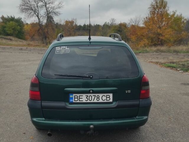 Зелений Опель Вектра, об'ємом двигуна 2.5 л та пробігом 280 тис. км за 2500 $, фото 12 на Automoto.ua