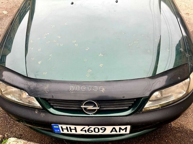Зеленый Опель Вектра, объемом двигателя 2 л и пробегом 260 тыс. км за 3200 $, фото 2 на Automoto.ua