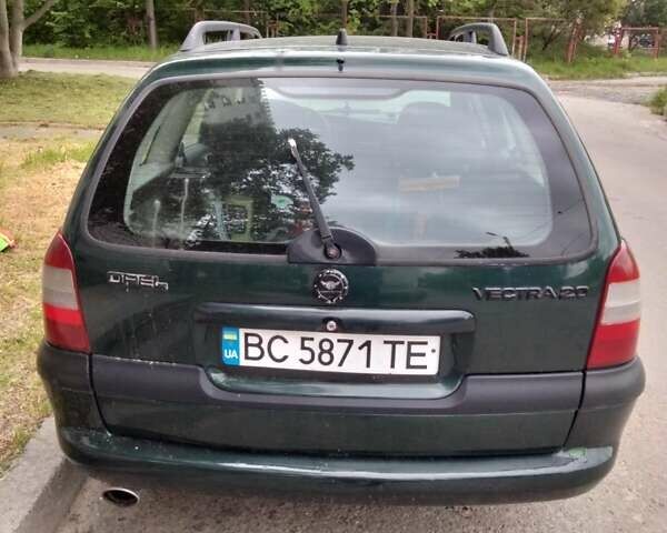 Зелений Опель Вектра, об'ємом двигуна 2 л та пробігом 355 тис. км за 1900 $, фото 9 на Automoto.ua