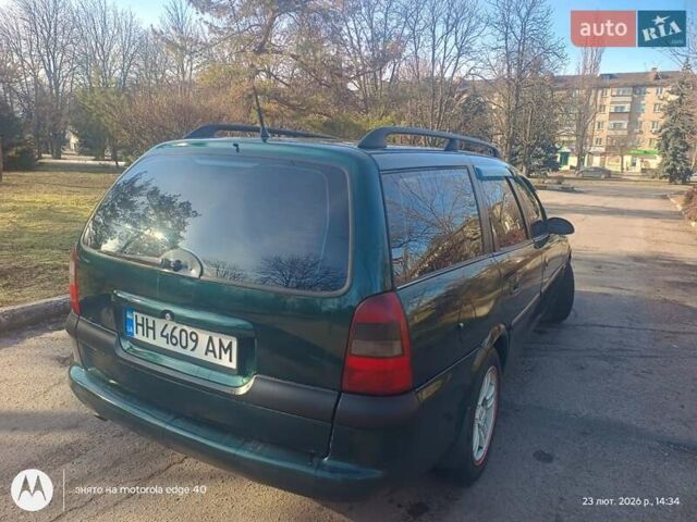 Зеленый Опель Вектра, объемом двигателя 2 л и пробегом 461 тыс. км за 2500 $, фото 9 на Automoto.ua