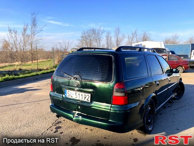 Зеленый Опель Вектра, объемом двигателя 20 л и пробегом 250 тыс. км за 1350 $, фото 1 на Automoto.ua