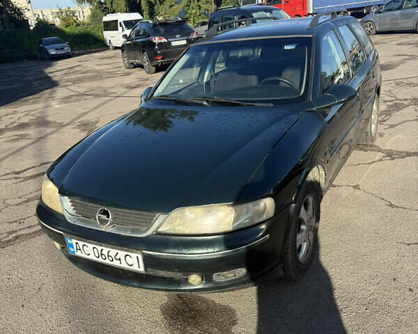 Зеленый Опель Вектра, объемом двигателя 2 л и пробегом 327 тыс. км за 3000 $, фото 2 на Automoto.ua