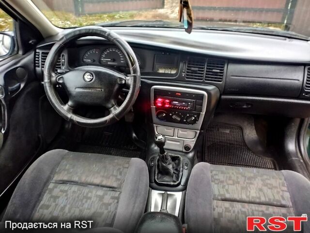 Зеленый Опель Вектра, объемом двигателя 2 л и пробегом 310 тыс. км за 2499 $, фото 5 на Automoto.ua