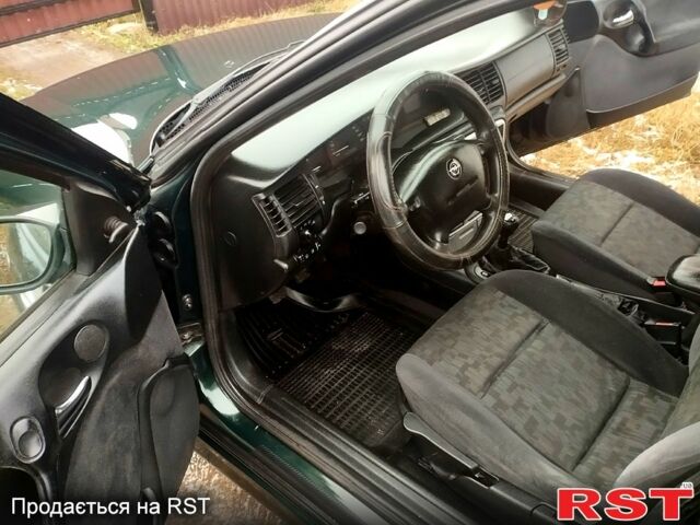 Зеленый Опель Вектра, объемом двигателя 2 л и пробегом 310 тыс. км за 2499 $, фото 11 на Automoto.ua