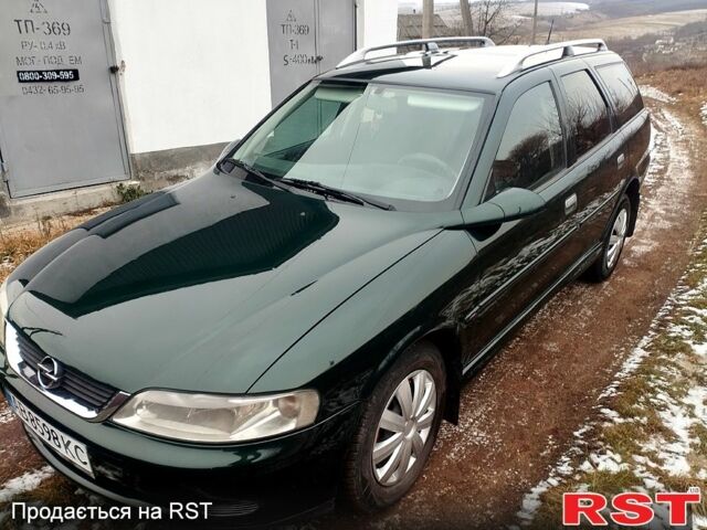 Зеленый Опель Вектра, объемом двигателя 2 л и пробегом 310 тыс. км за 2499 $, фото 2 на Automoto.ua