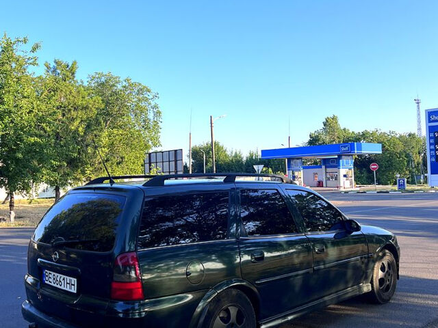 Зеленый Опель Вектра, объемом двигателя 2 л и пробегом 271 тыс. км за 2750 $, фото 3 на Automoto.ua