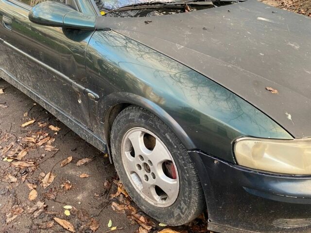 Зеленый Опель Вектра, объемом двигателя 2 л и пробегом 500 тыс. км за 759 $, фото 5 на Automoto.ua