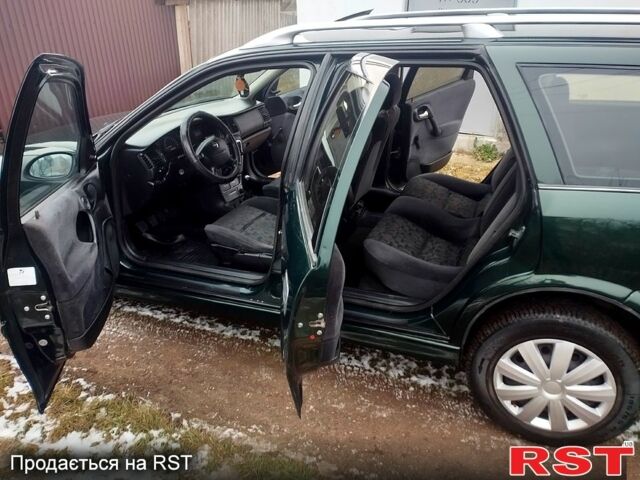 Зеленый Опель Вектра, объемом двигателя 2 л и пробегом 310 тыс. км за 2499 $, фото 4 на Automoto.ua