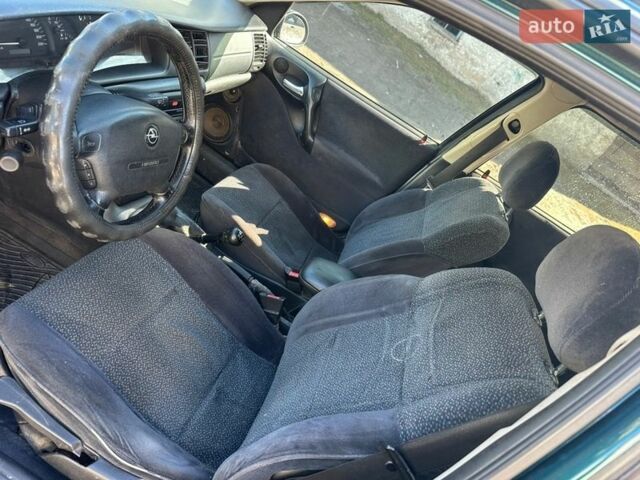 Зелений Опель Вектра, об'ємом двигуна 1.8 л та пробігом 340 тис. км за 2300 $, фото 5 на Automoto.ua