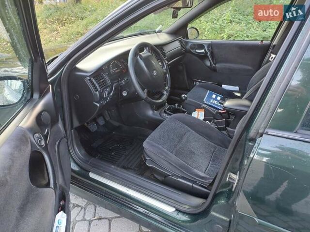 Зеленый Опель Вектра, объемом двигателя 2.17 л и пробегом 309 тыс. км за 1750 $, фото 2 на Automoto.ua