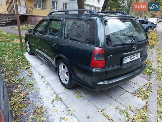 Зелений Опель Вектра, об'ємом двигуна 2.2 л та пробігом 306 тис. км за 1900 $, фото 2 на Automoto.ua