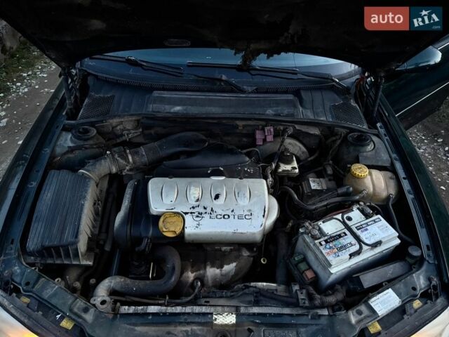 Зеленый Опель Вектра, объемом двигателя 1.8 л и пробегом 484 тыс. км за 1600 $, фото 10 на Automoto.ua