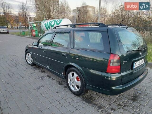 Зеленый Опель Вектра, объемом двигателя 2.17 л и пробегом 309 тыс. км за 1750 $, фото 7 на Automoto.ua