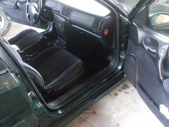 Зелений Опель Вектра, об'ємом двигуна 2.2 л та пробігом 235 тис. км за 2250 $, фото 15 на Automoto.ua