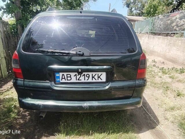 Зелений Опель Вектра, об'ємом двигуна 1.8 л та пробігом 337 тис. км за 2300 $, фото 17 на Automoto.ua