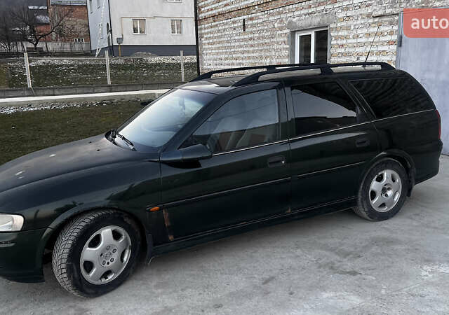 Зеленый Опель Вектра, объемом двигателя 2 л и пробегом 346 тыс. км за 1950 $, фото 1 на Automoto.ua