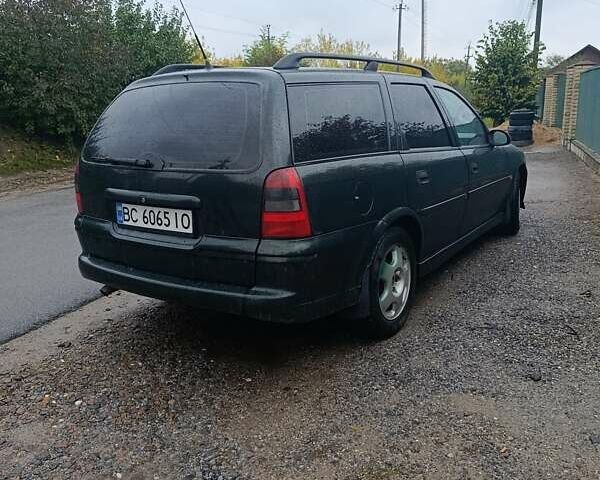 Зеленый Опель Вектра, объемом двигателя 2 л и пробегом 350 тыс. км за 3250 $, фото 2 на Automoto.ua