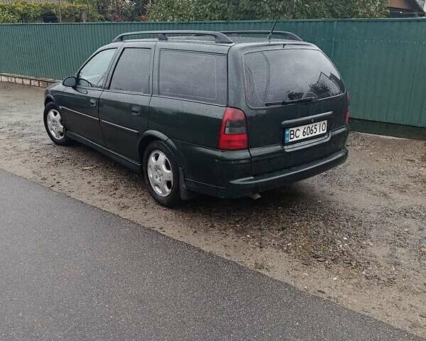 Зеленый Опель Вектра, объемом двигателя 2 л и пробегом 350 тыс. км за 3250 $, фото 1 на Automoto.ua