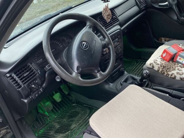 Зелений Опель Вектра, об'ємом двигуна 2 л та пробігом 350 тис. км за 3200 $, фото 3 на Automoto.ua