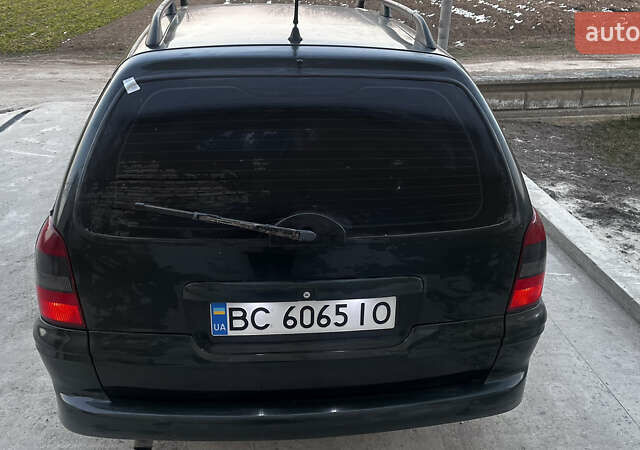Зеленый Опель Вектра, объемом двигателя 2 л и пробегом 346 тыс. км за 1950 $, фото 3 на Automoto.ua