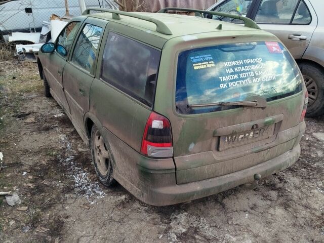 Зеленый Опель Вектра, объемом двигателя 2 л и пробегом 325 тыс. км за 1200 $, фото 2 на Automoto.ua