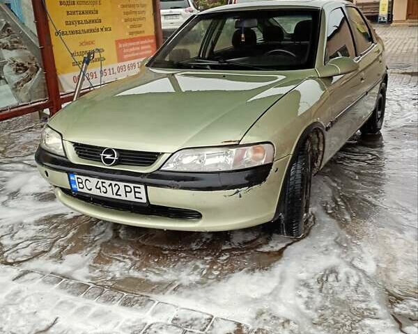 Зеленый Опель Вектра, объемом двигателя 2 л и пробегом 392 тыс. км за 1800 $, фото 2 на Automoto.ua