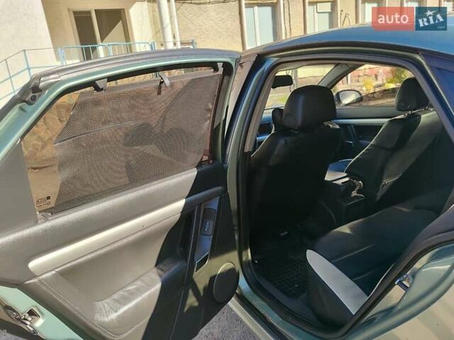 Зеленый Опель Вектра, объемом двигателя 1.9 л и пробегом 340 тыс. км за 3300 $, фото 19 на Automoto.ua