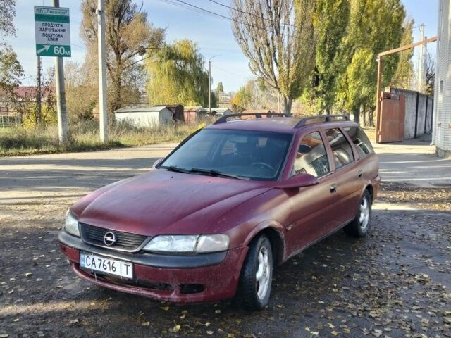 Красный Опель Вита, объемом двигателя 2 л и пробегом 350 тыс. км за 1250 $, фото 1 на Automoto.ua