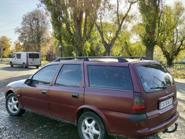 Красный Опель Вита, объемом двигателя 2 л и пробегом 350 тыс. км за 1250 $, фото 2 на Automoto.ua