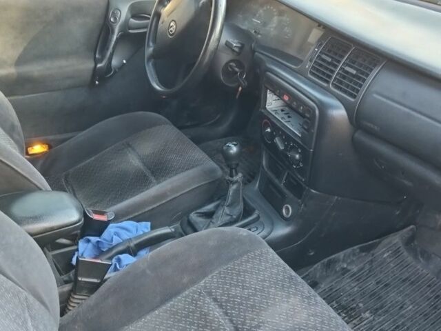 Красный Опель Вита, объемом двигателя 2 л и пробегом 350 тыс. км за 1250 $, фото 5 на Automoto.ua