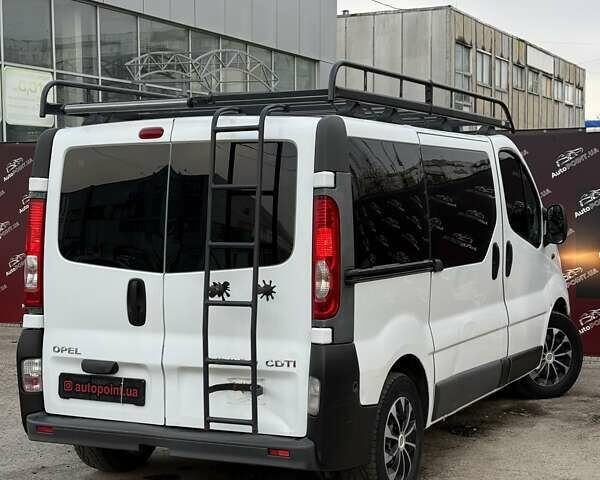 Опель Віваро 2011 у Сумах на Automoto.ua Білий Опель Віваро, об'ємом двигуна 2 л та пробігом 294 тис. км за 10800 $, фото 6 на Automoto.ua